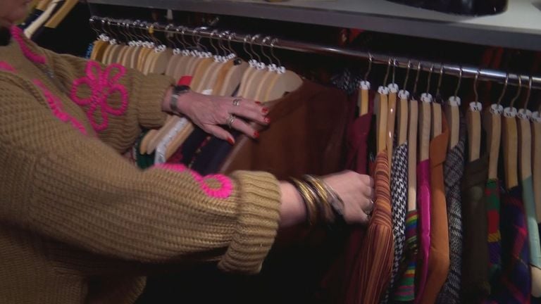 Browsing through the racks of party clothes (image: Omroep Brabant).