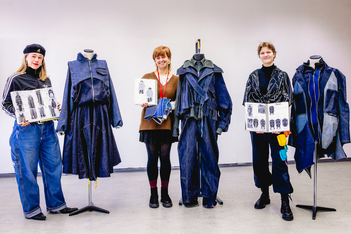 Participants in the course present their denim designs