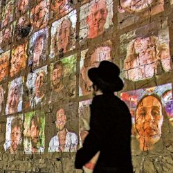 Projected image of the hostages on October 7, 2023, in Jerusalem. | Photo:AFP