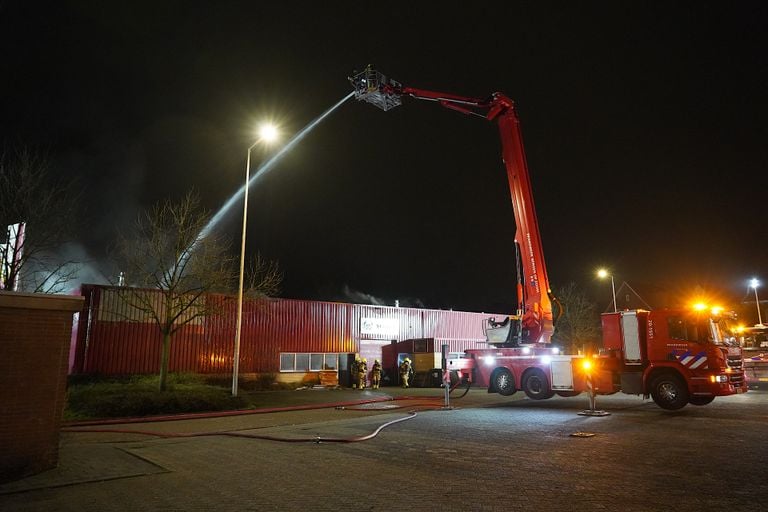 The fire is also being extinguished from an aerial platform at the rear. Photo: Jeroen Stuve / SQ Vision