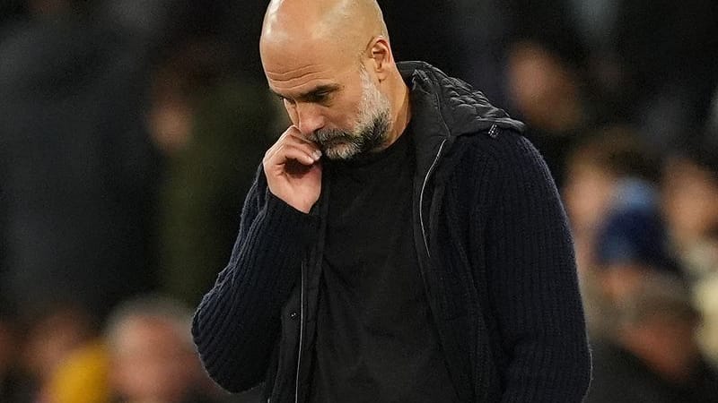 Manchester City coach Pep Guardiola reacts on the sidelines.