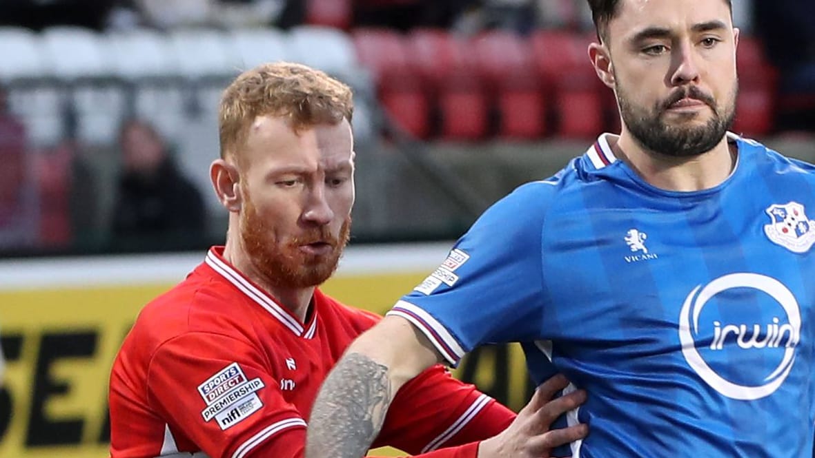 Michael Newberry (l.) at a game with Cliftonville: The professional footballer died unexpectedly. Michael Newberry (l.) at a game with Cliftonville: The professional footballer died unexpectedly.