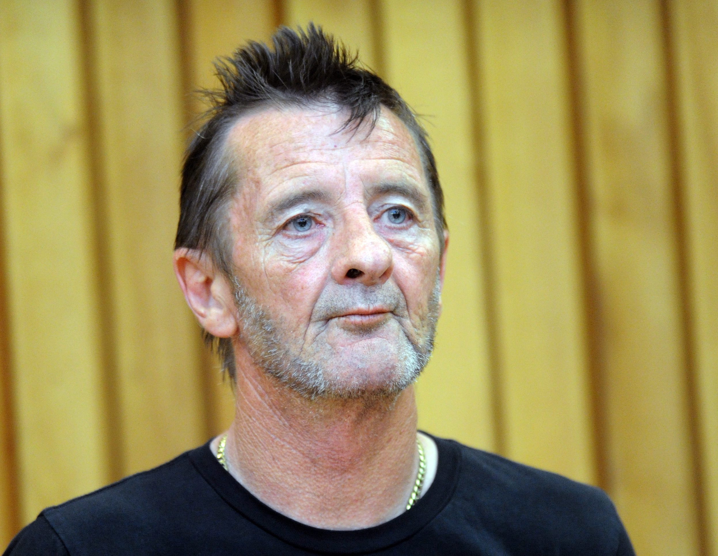 AC/DC drummer Phil Rudd was sentenced to eight months of house arrest for drug possession and threats of murder