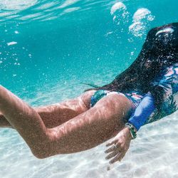 Yoga in the water. | Photo:Ticky Yoga