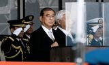 Japan's Prime Minister Shigeru Ishiba hopes to be reappointed as prime minister on Monday despite his party's poor election results. On Saturday he inspected troops at Camp Asaka, near Tokyo. Koji Harada/Kyodo News via AP  