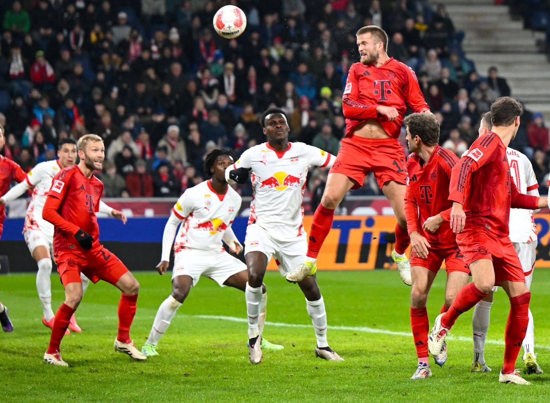 Eric Dier (on the ball) scores the first goal of the game.