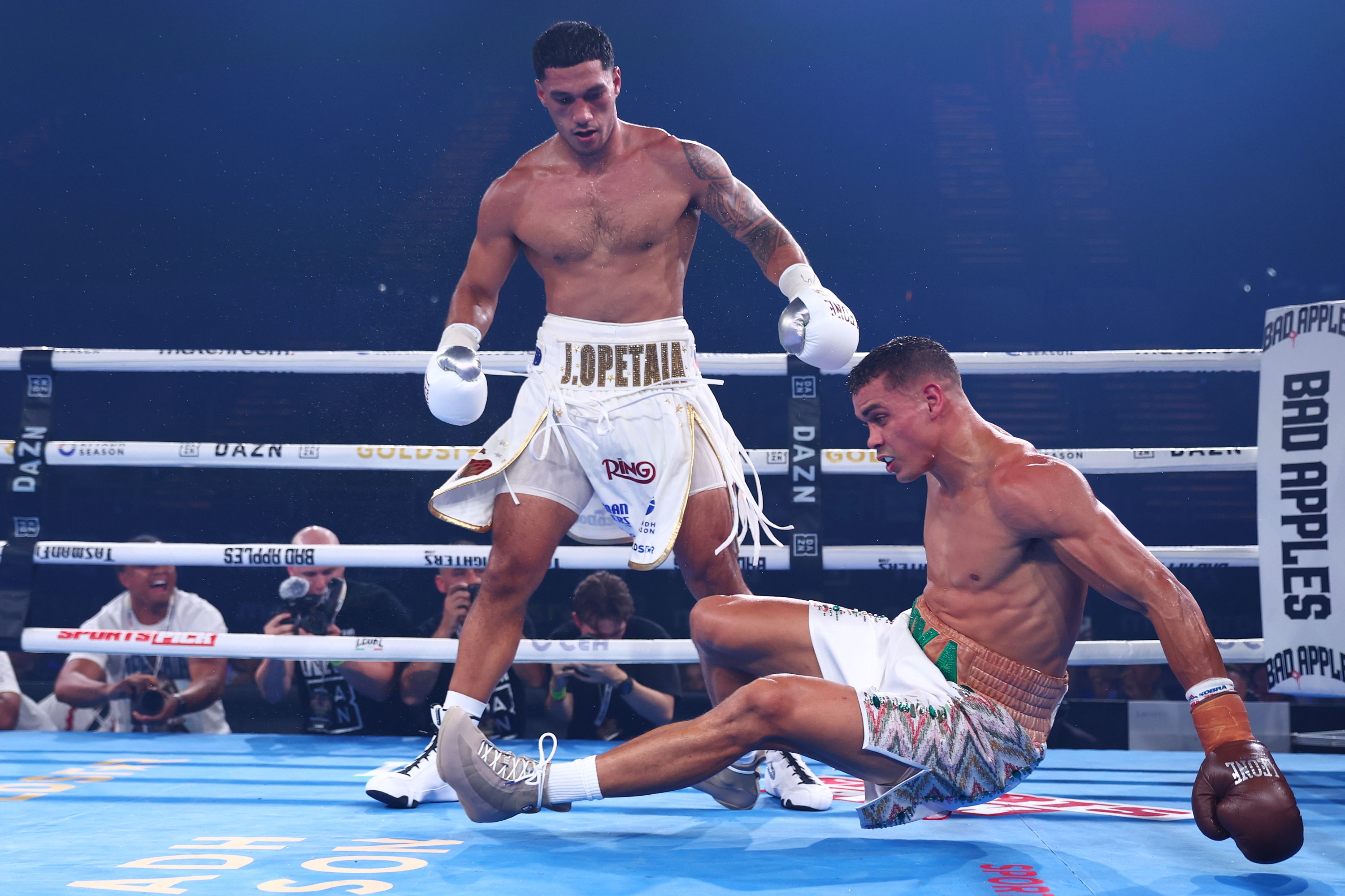 GOLD COAST, AUSTRALIA - JANUARY 08: Jai Opetaia knocks down David Nyika during the IBF And Ring Magazine Cruiserweight World Title Fight between Jai Opetaia and David Nyika at the Gold Coast Convention Center on January 08, 2025 in Gold Coast, Australia. (Photo by Chris Hyde/Getty Images)
