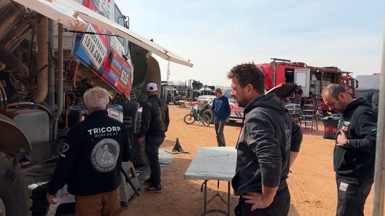 Maurik van den Heuvel looks at his broken truck 