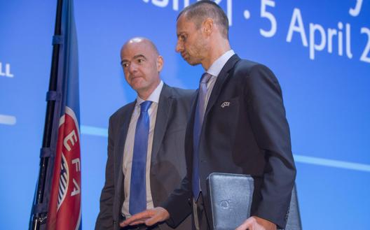 Gianni Infantino, 51, FIFA president, and Aleksander Ceferin, 54, UEFA president. Handle