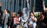 Students, teachers and staff of the University of Amsterdam, who demonstrated to express their solidarity with pro-Palestinian students who had set up a protest camp a day earlier and were removed by the police.