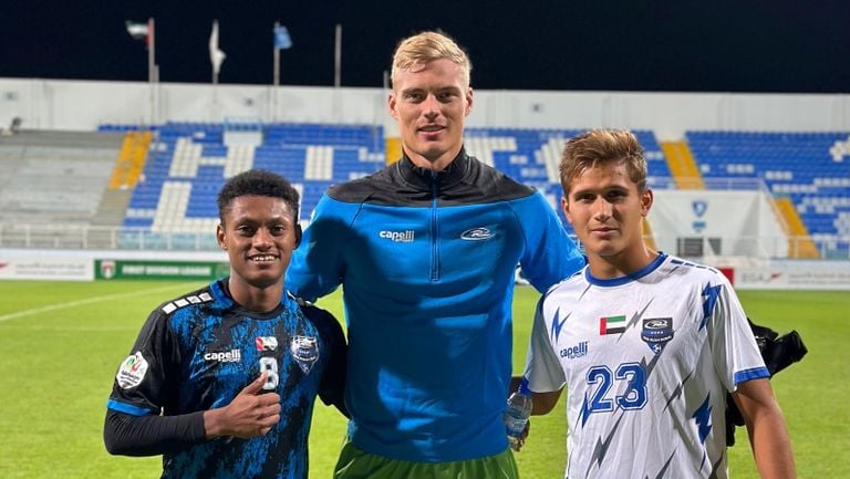 Bram Stolp with two teammates.