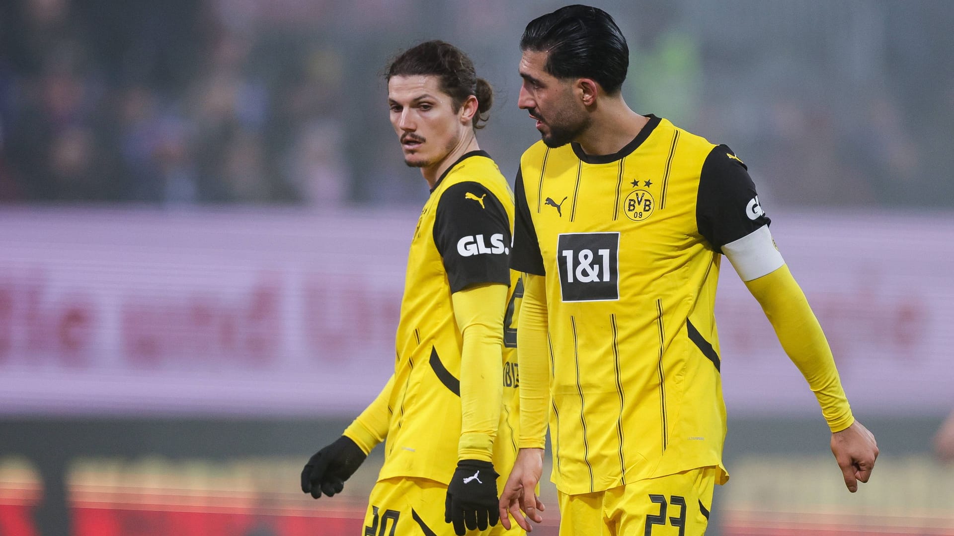 At a loss: Dortmund's Sabitzer (left) and Can in the game in Kiel. At a loss: Dortmund's Sabitzer (left) and Can in the game in Kiel.
