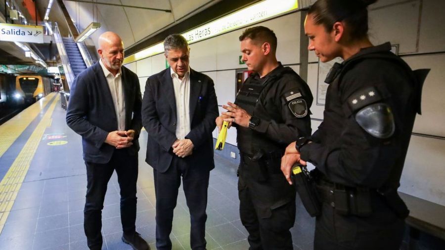 Wolff and Macri with police officers
