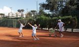 Mattia Maselli (11) and Antonio Fenicia (11, right) during training with their coach Fabrizio Fanucci at Tennisclub Parioli in Rome. 