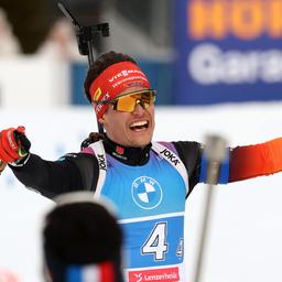 The German biathlete Philipp Horn is happy about bronze