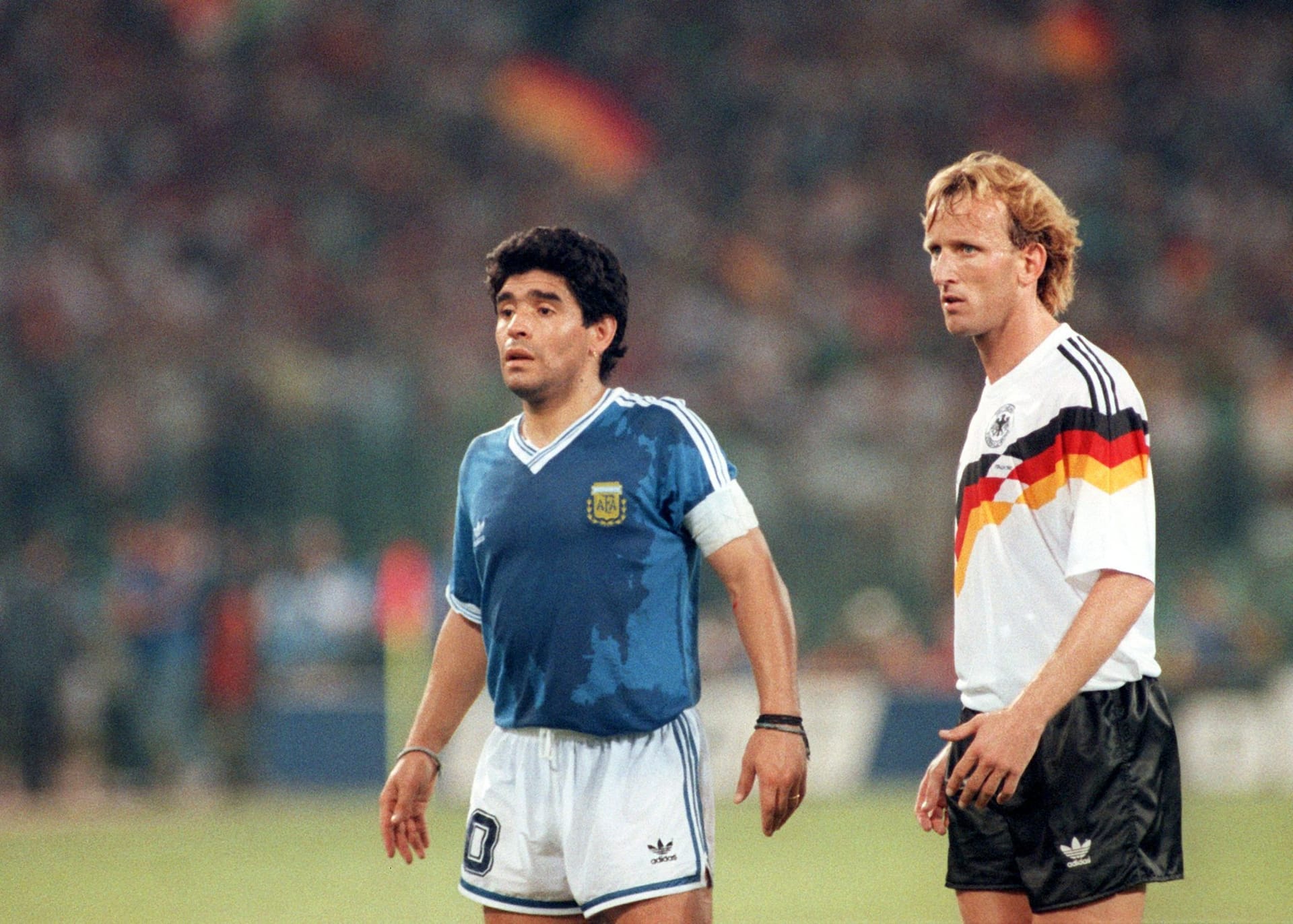 Andreas Brehme (right) in the 1990 World Cup final alongside Diego Maradona.