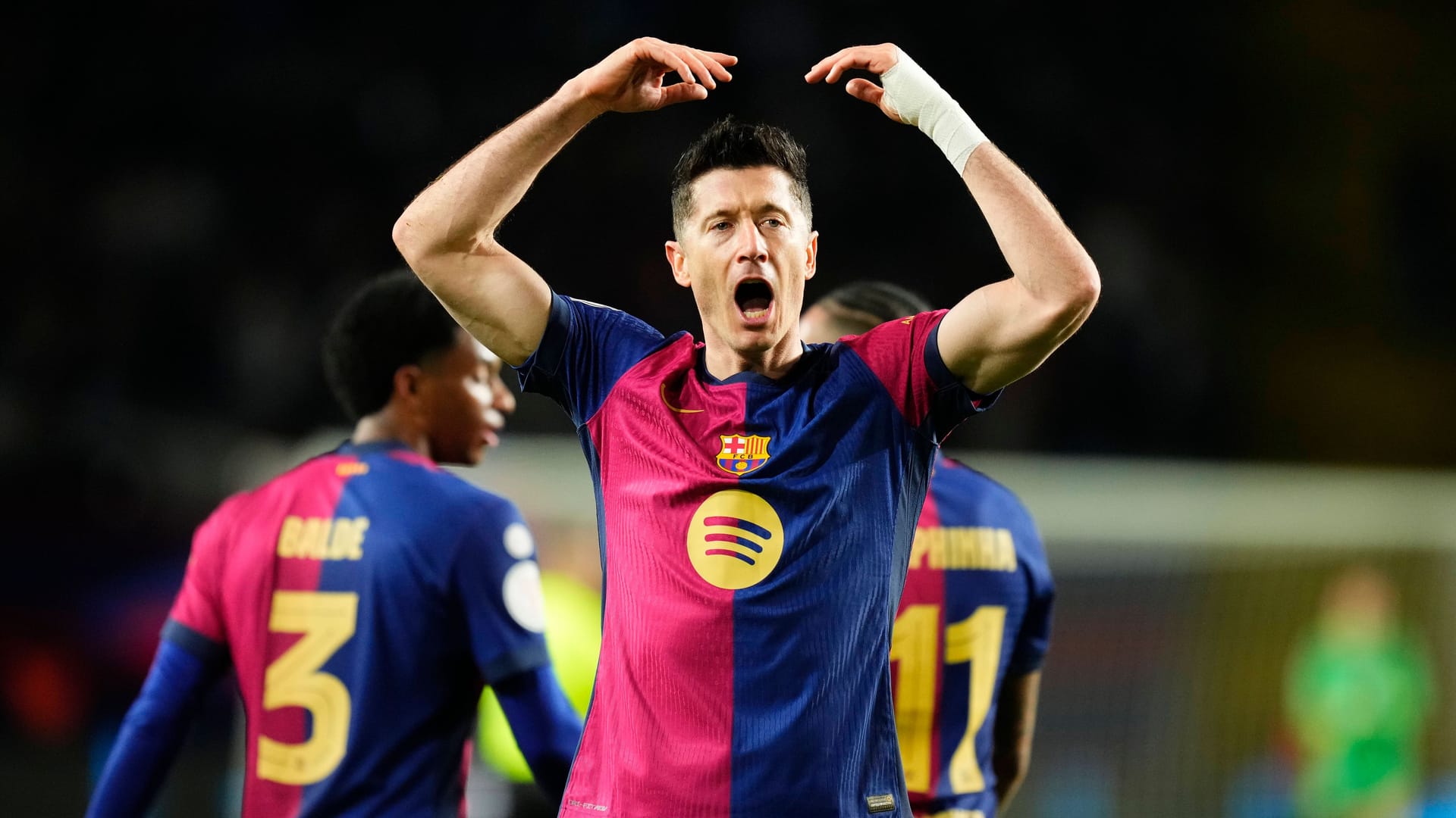 Barcelona striker Robert Lewandowski cheered on home fans.