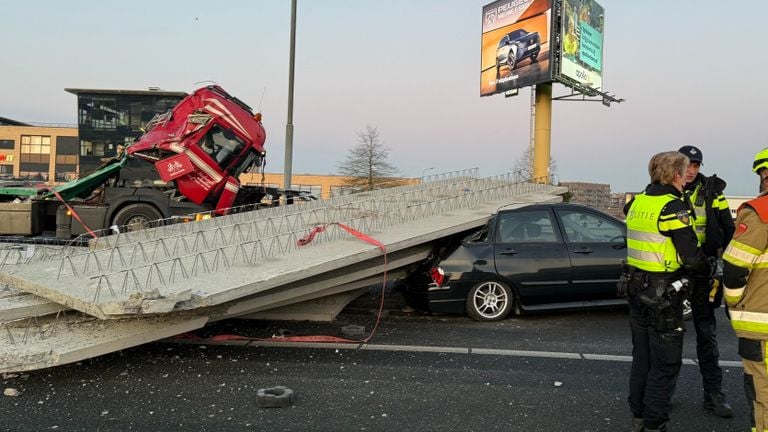 The concrete plates ended up on top of the car (photo: SQ Vision).