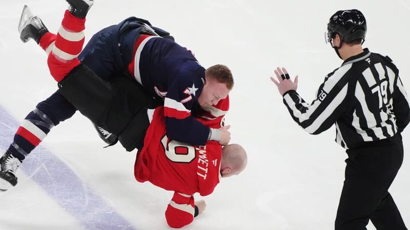 Ice hockey fight: Brady Tkachuk (above) from the United States fights Sam Bennett from Canada during the first half.