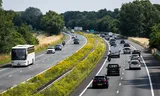 The A30 near Lunteren, with flowering flowers in the central reservation. 
