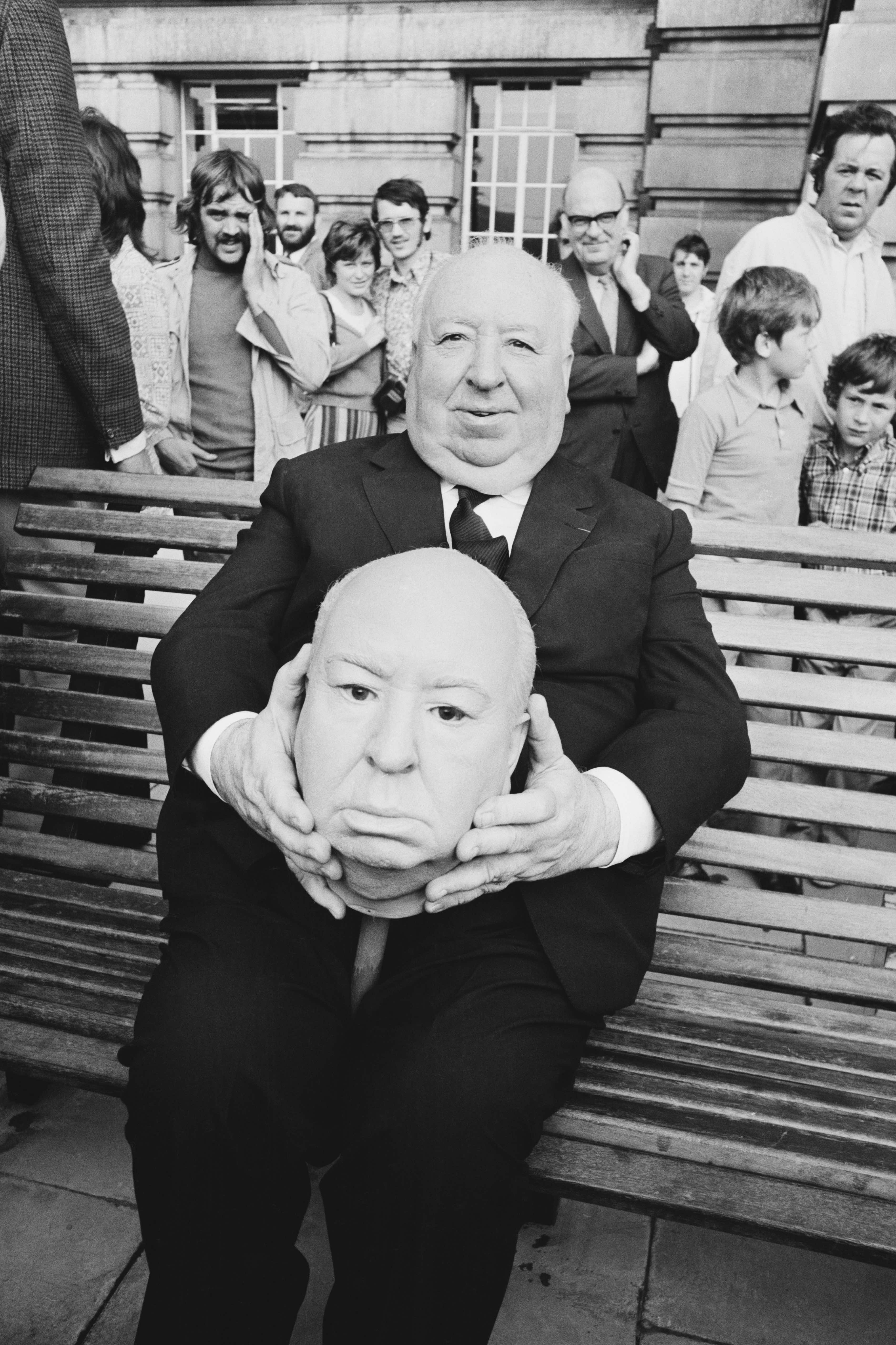 Alfred Hitchcock with a replica Hitch head