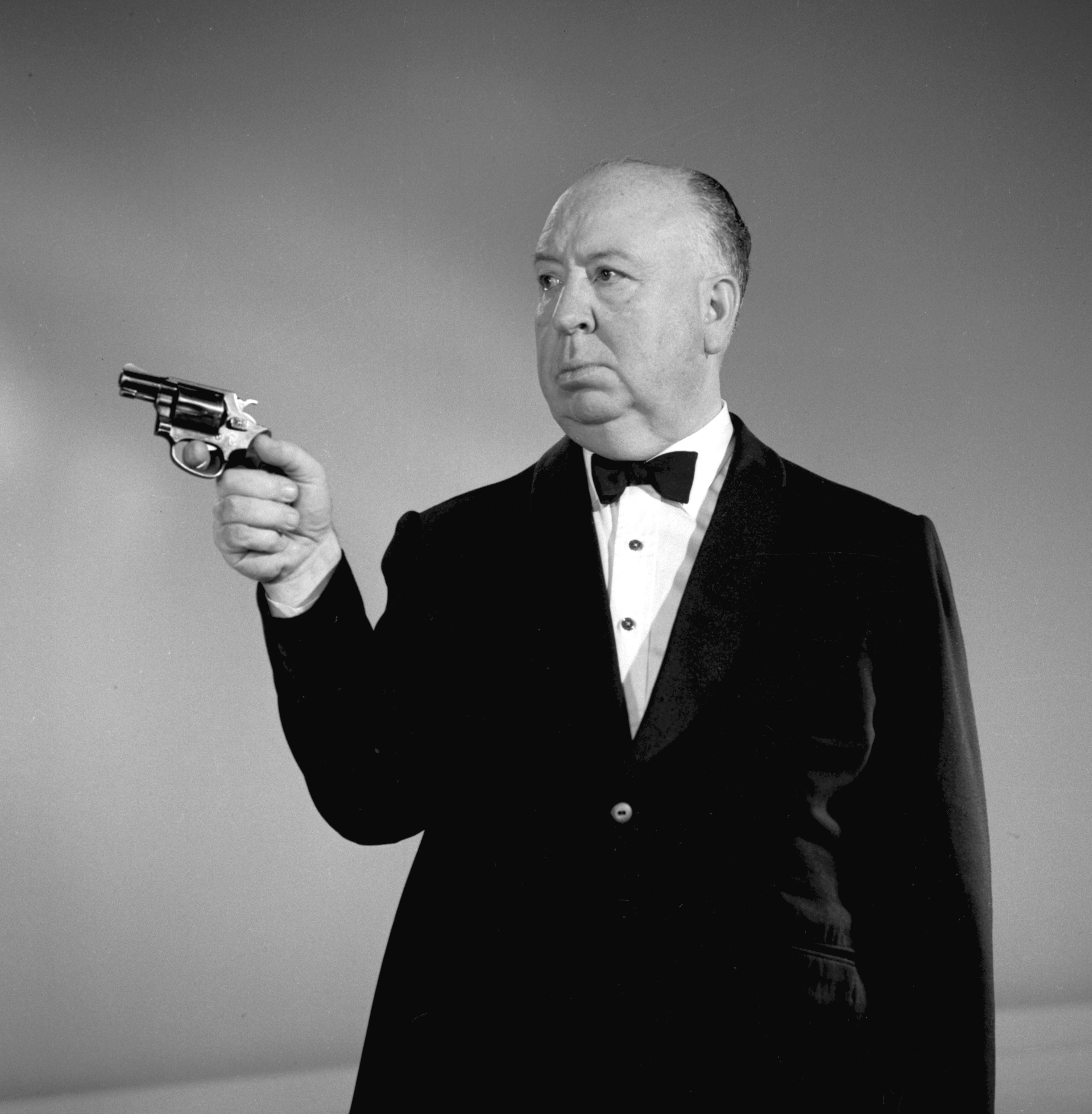 Alfred Hitchcock with weapon