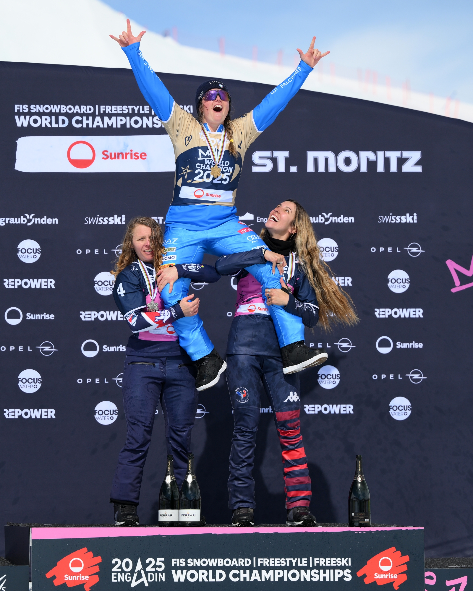 St Moritz, Switzerland - March 28: Michela Moioli of Italy Celebrates Winning The Women's Snowboard Cross Big Final and is Held Up by 2nd Charlotte Bankes of Great Britain and 3rd Place Julia Pereira de Sousa of France Day 12 of the fis snowboard, freestyle and freeski world Championship 2025 on March 28, 2025 in Corviglia, St. Moritz, Switzerland. (Photo by David Ramos/Getty Images)
