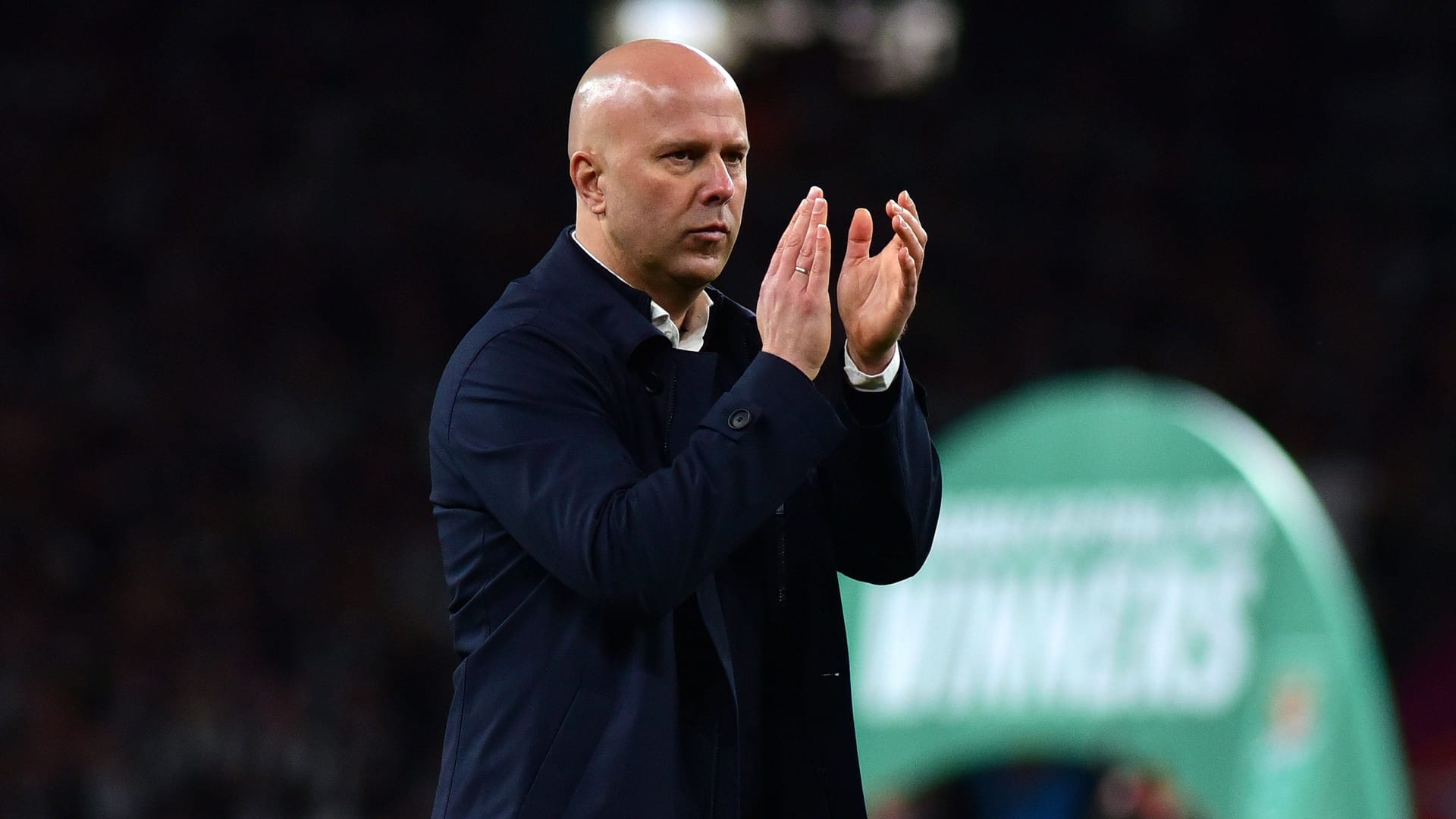 Painful defeat: Arne Slot applauded the Liverpool fans.