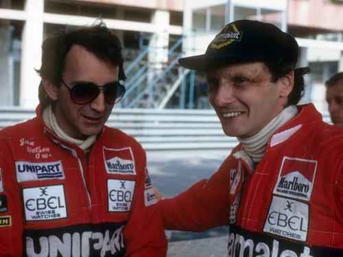 John Watson (left) with his famous teammate Niki Lauda