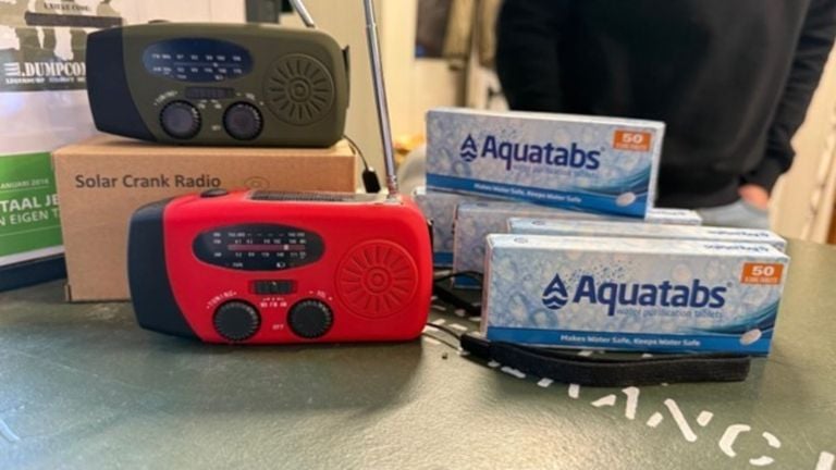 An emergency radio and water treatment tablets for an emergency package (photo: southwest).
