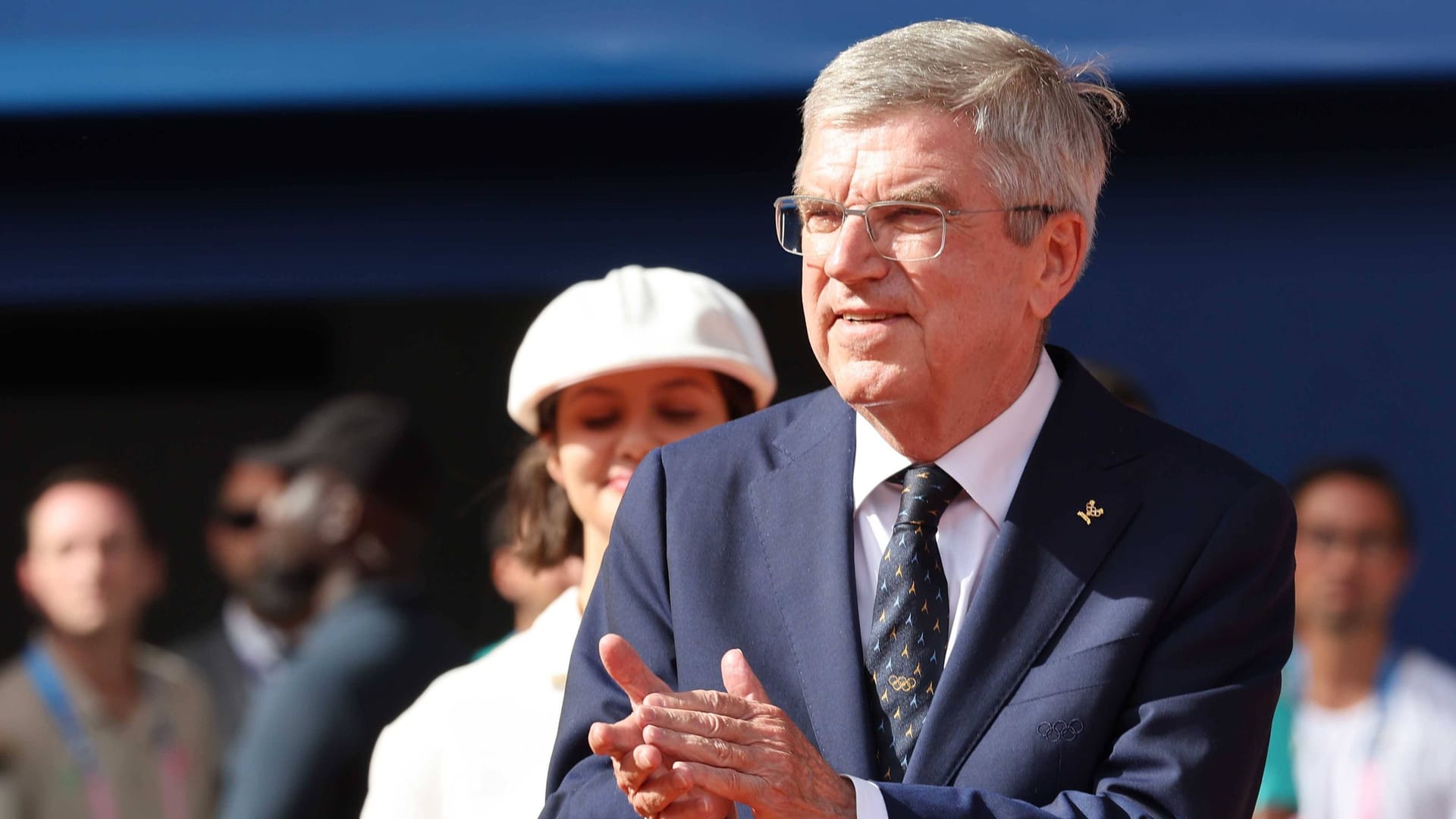 Thomas Bach: He is the head of the IOC.