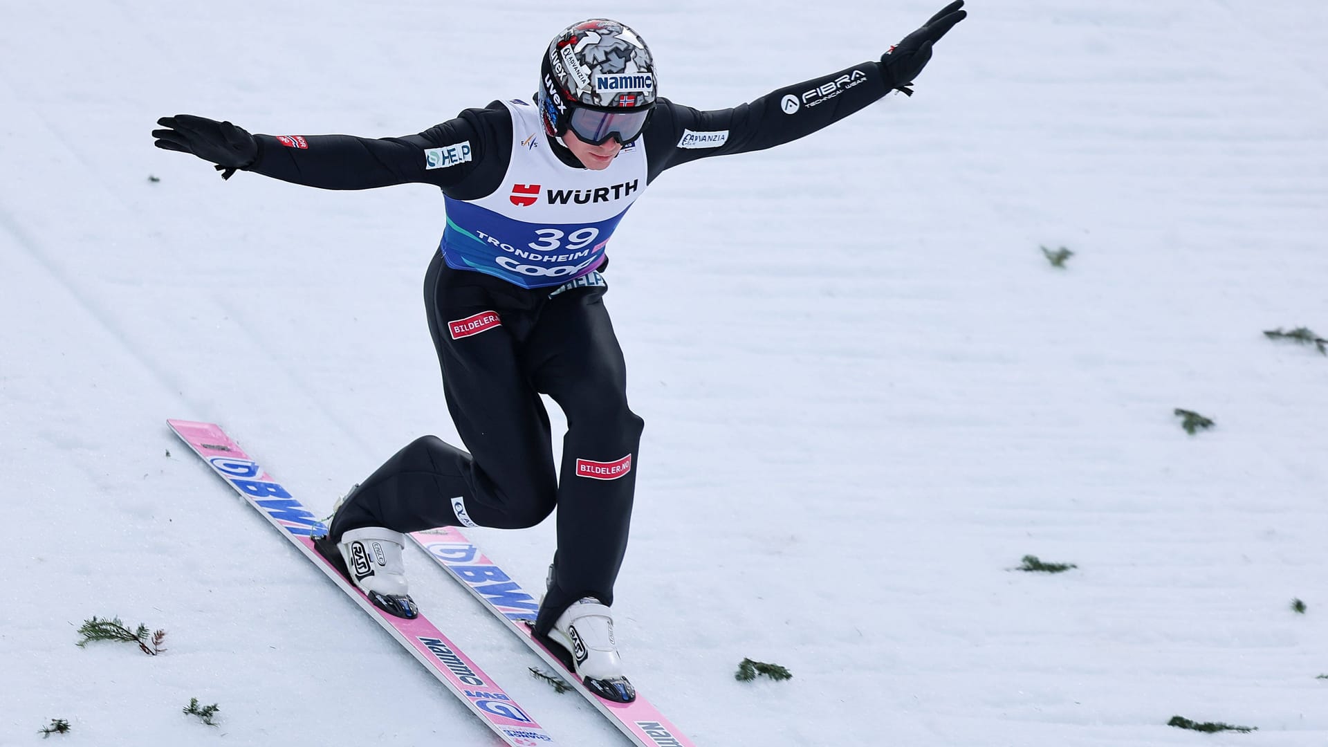 Marius Lindvik: The Norwegian got World Cup gold from the normal hill, and he was revoked his silver medal from the Großchanze because of the suit manipulation.