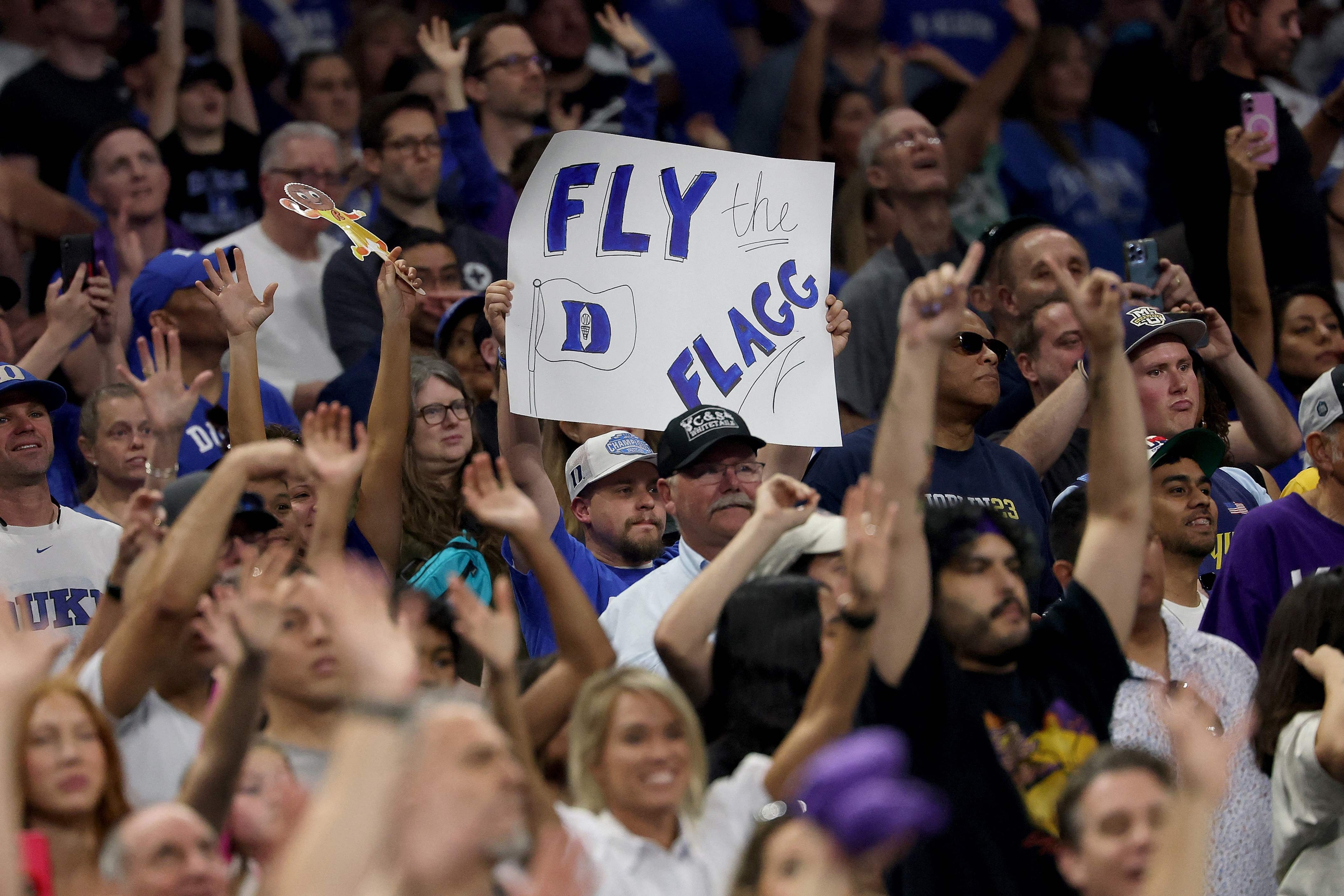 San Antonio, Texas - April 04: Duke Blue Devils Fans Cheer During a Practice Session Ahead of the Final Four in the NCAA Men's Basketball Tournament at Alamodome on April 04, 2025 in San Antonio, Texas. Jamie Squire / Getty Images / AFP (Photo by Jamie Squire / Getty Images North America / Getty Images Via AFP)