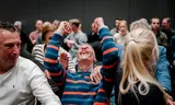 Interested parties in the public gallery are pleased with the council decision that there will be no asylum seekers' center in Heerle in Noord-Brabant. Marco de Swart / ANP 