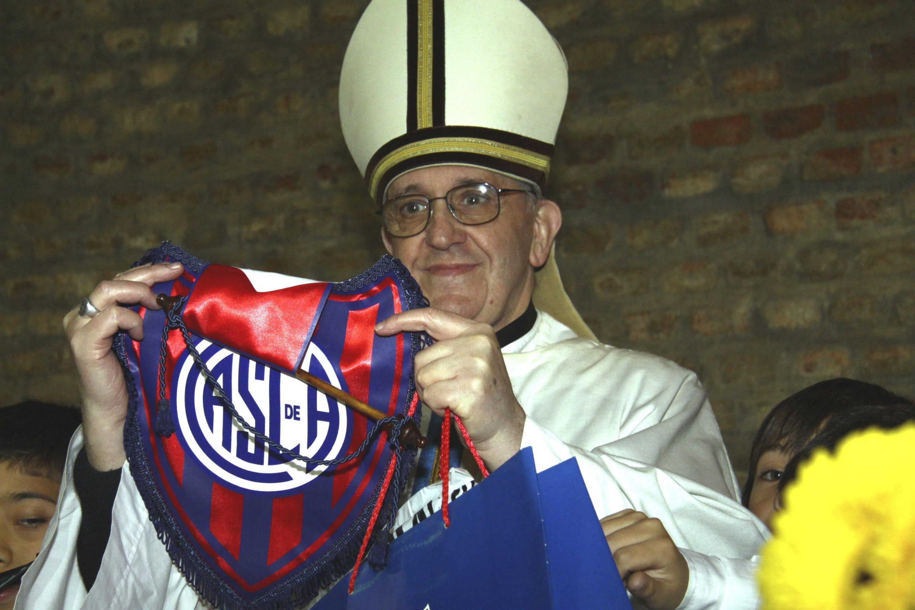 EPA03624672 AN UNDATED Handout Picture Provided by Argentinian Soccer Club San Lorenzo de Almagro on 14 March 2013 Shows Argentinian Cardinal Jorge Mario Bergoglio, Current Pope Francis, Holding a Shirt of the San Lorenzo de Almagro Soccer Team of Which He is a fan, in buenos Aires, Argentina. EPA/Club Atletico San Lorenzo de Almagro/Handout Editorial Use Only/No Sales