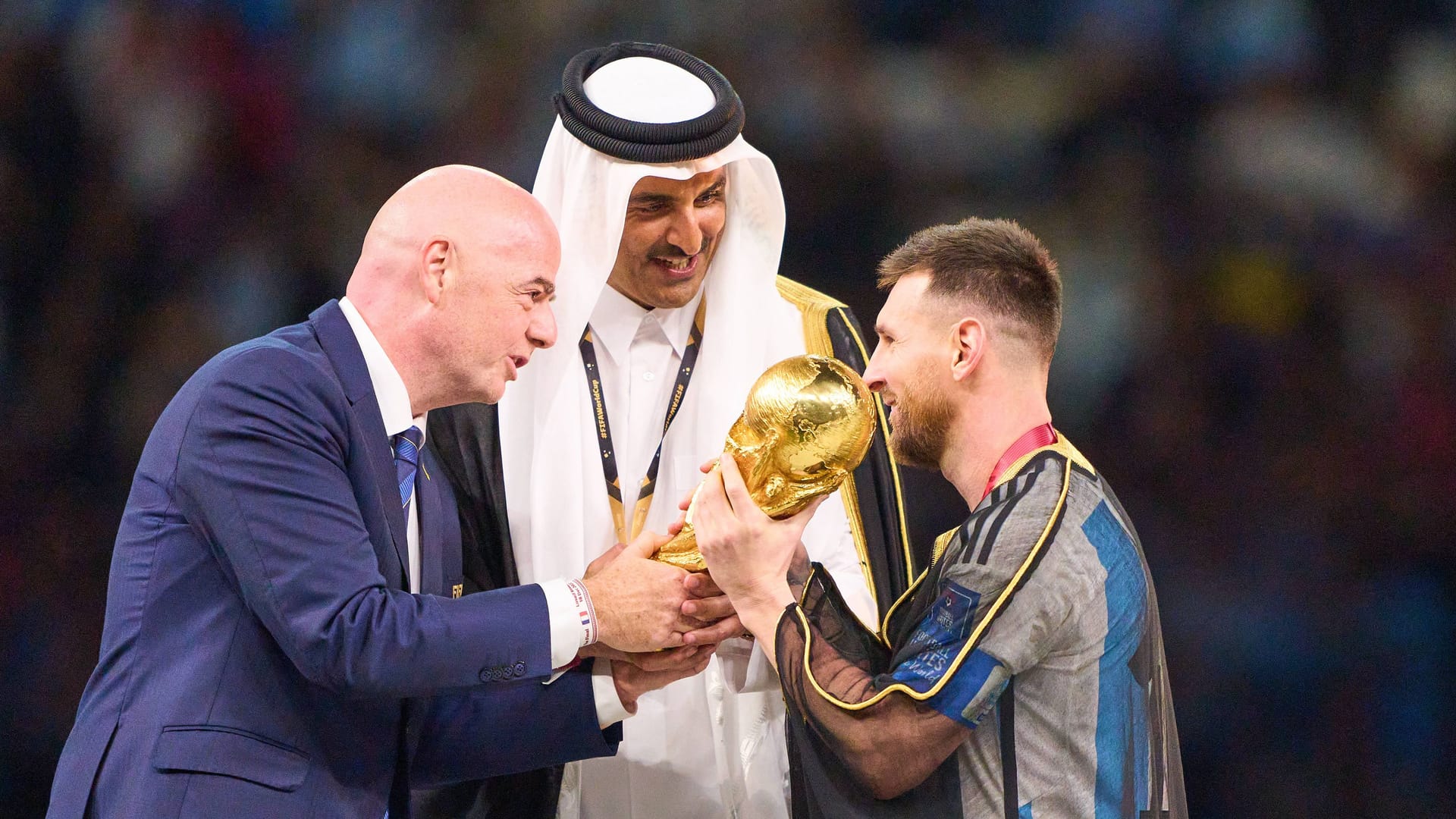 Lionel Messi (right) and the World Cup Cup: Argentina is reigning world champion.