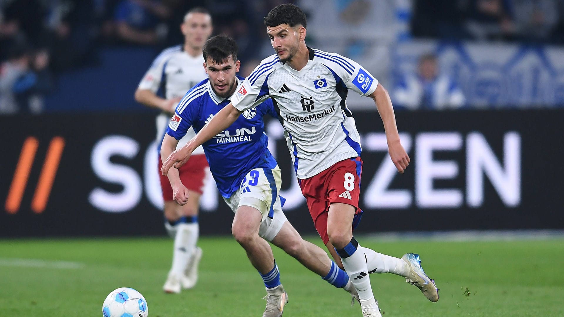 Mehmet Aydin (left) in duel with Daniel Elfadli: The Schalke defender could possibly switch to HSV in summer.