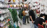 Customers purchase Christmas decorations on an international trade market in the Chinese city of Yiwu. Photo Go Nakamura/Reuters 
