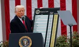 President Trump presents the list of 'reciprocal' rates, on Wednesday in the rose garden of the White House. Photo Carlos Barria/Reuters