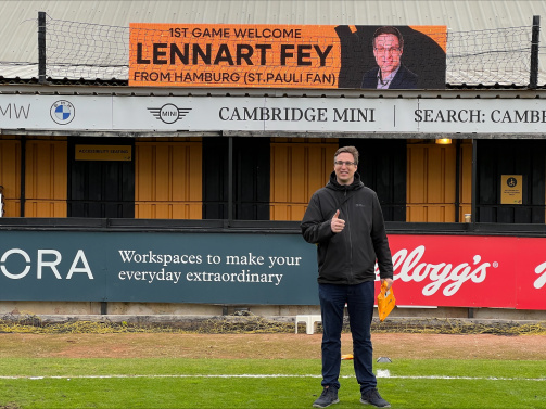 TM-user Lenn1988 in front of a scoreboard in the Cledara Abbey Stadium of Cambridge United, where he is welcomed to his first visit © Lennart Fey - TM -user Lenn1988 in front of a scoreboard in the Cledara Abbey Stadium of Cambridge United, where he is welcomed to his first visit