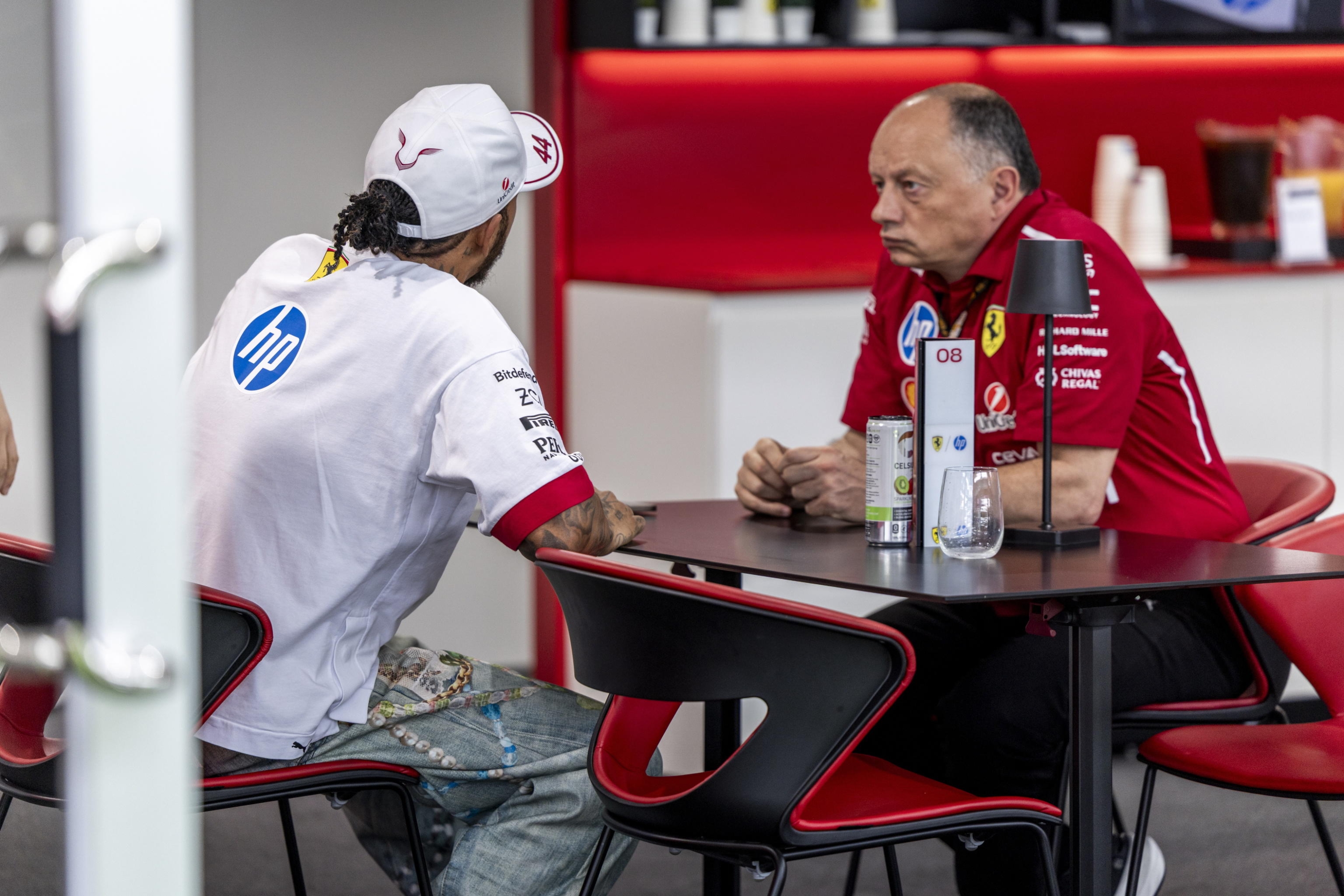 EPA12073301 Scuderia Ferrari Team Principal Frederic Vasseur (R) Talks with Scuderia Ferrari Driver Lewis Hamilton of Britain (L) in The Teamâ? S Hospitality Suite Prior to the Formula 1 Miami Grand Prix at the Miami International Autodrome in Miami Gardens, Florida, USA, 04 May 2025. EPA/SHAWN THEW
