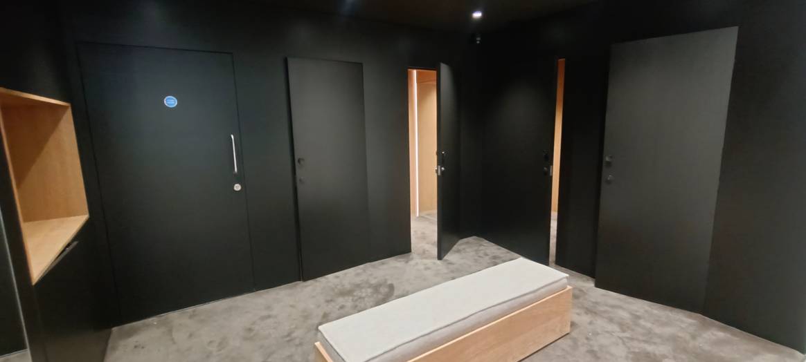 Rear shop area with changing rooms.