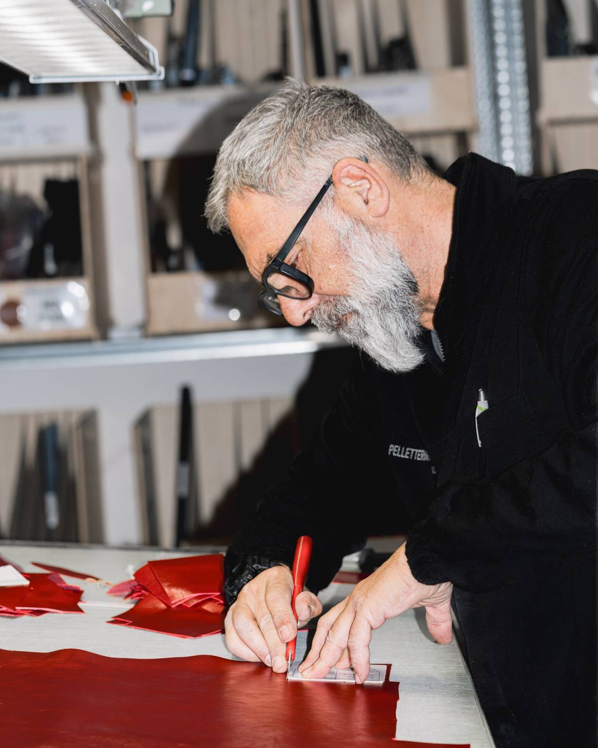 Cutting the leather pieces.