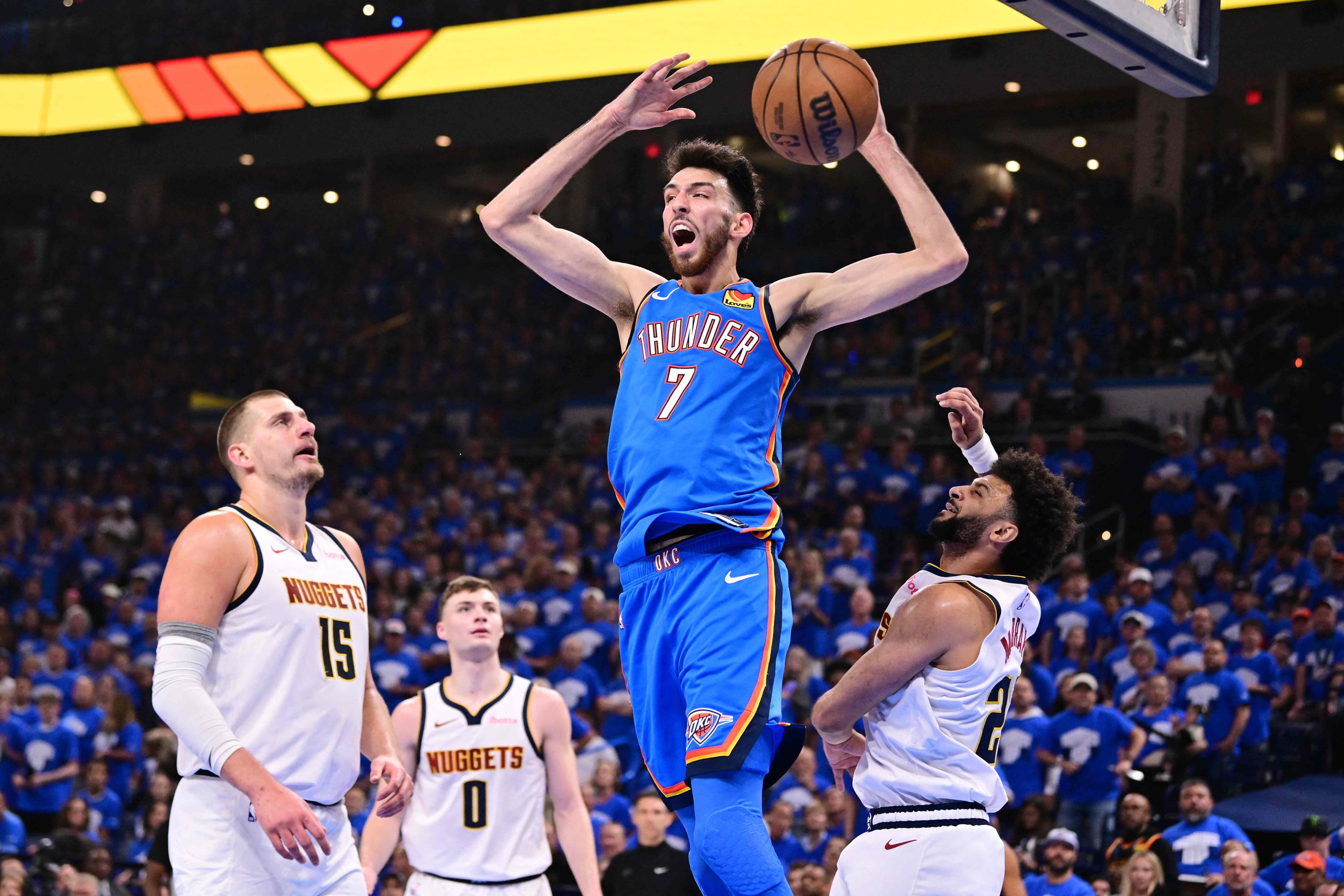 Oklahoma City, Oklahoma - May 18: Chet Holmgren #7 of the Oklahoma City Thunder Reacts After Slam Dunking Over Nikola Jokic #15 Jamal Murray #27 of the Denver Nuggets During the Second Quarter in Game Seven of the Western Conference Second Round Playoffs At Paycom Center on May 18, 2025 in Oklahoma City, Oklahoma. Notes to User: User Expressly Acknowledges and Agrees That, by Downloading and or Using This Photograph, User is allowed to the Terms and Conditions of the Getty Images License Agreement. Joshua Gateley / Getty Images / AFP (Photo by Joshua Gateley / Getty Images North America / Getty Images Via AFP)