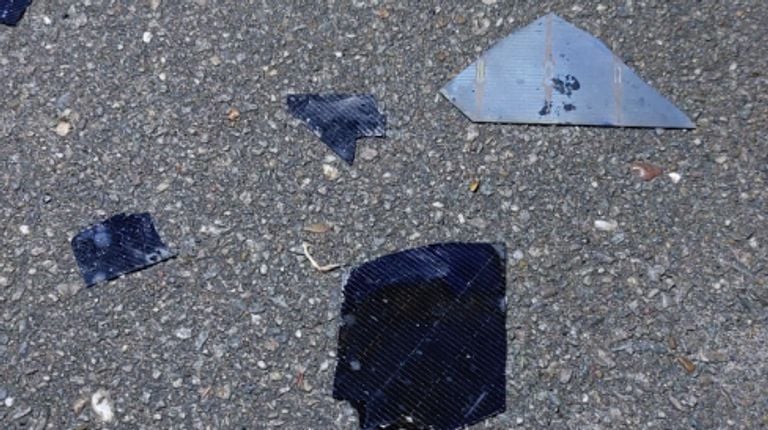 Pieces of the solar panels on the street in Rijen (photo: Kevin Berenschot).