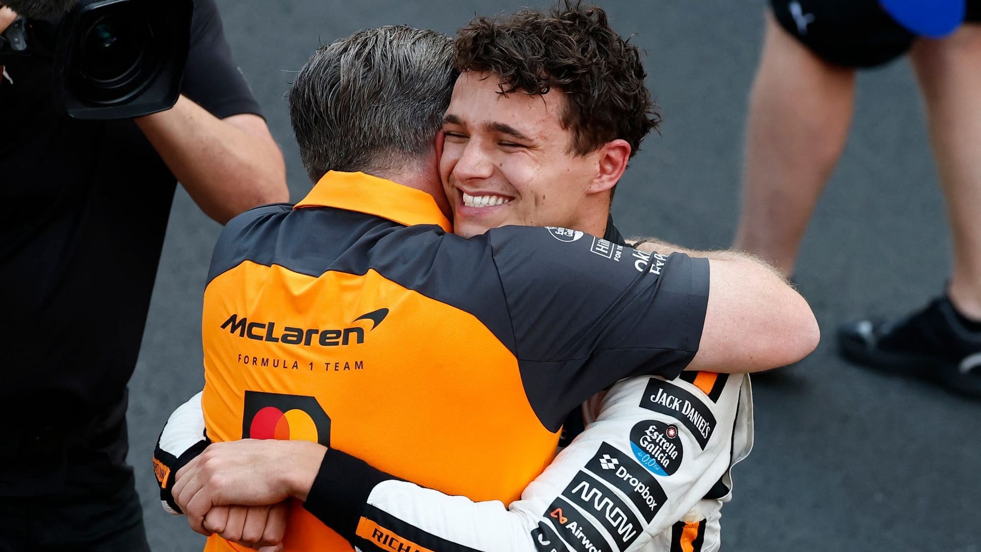 First success in Monaco: Lando Norris (right) is hung by McLaren team boss Zak Brown.