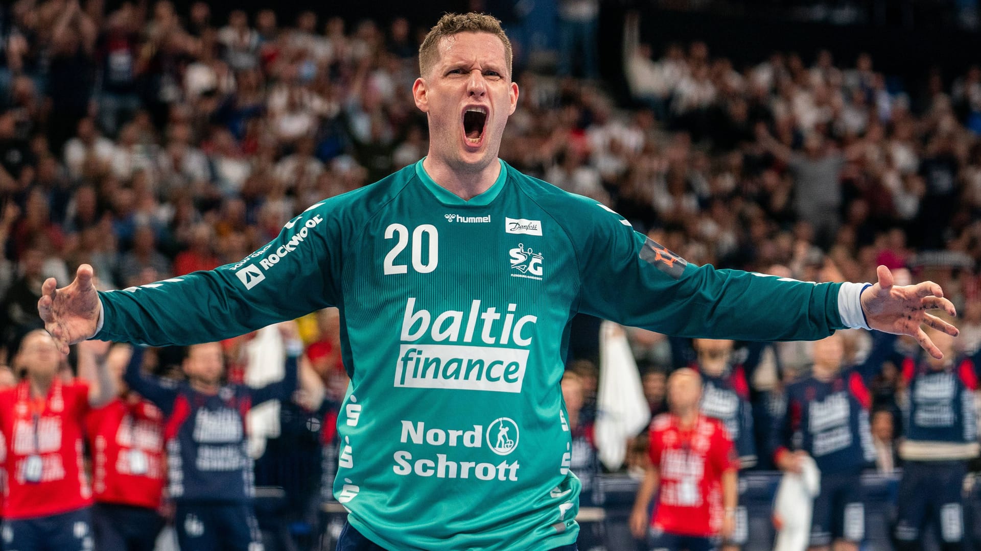 Goalkeeper Kevin Möller from SG Flensburg-Handewitt cheers.