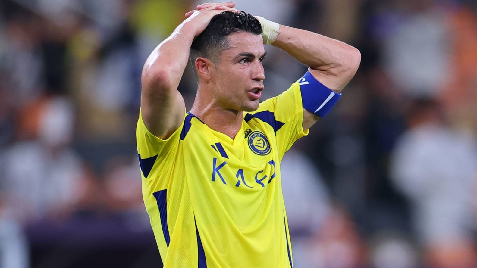 Stunned: Cristiano Ronaldo in the game against Kawasaki Frontale.