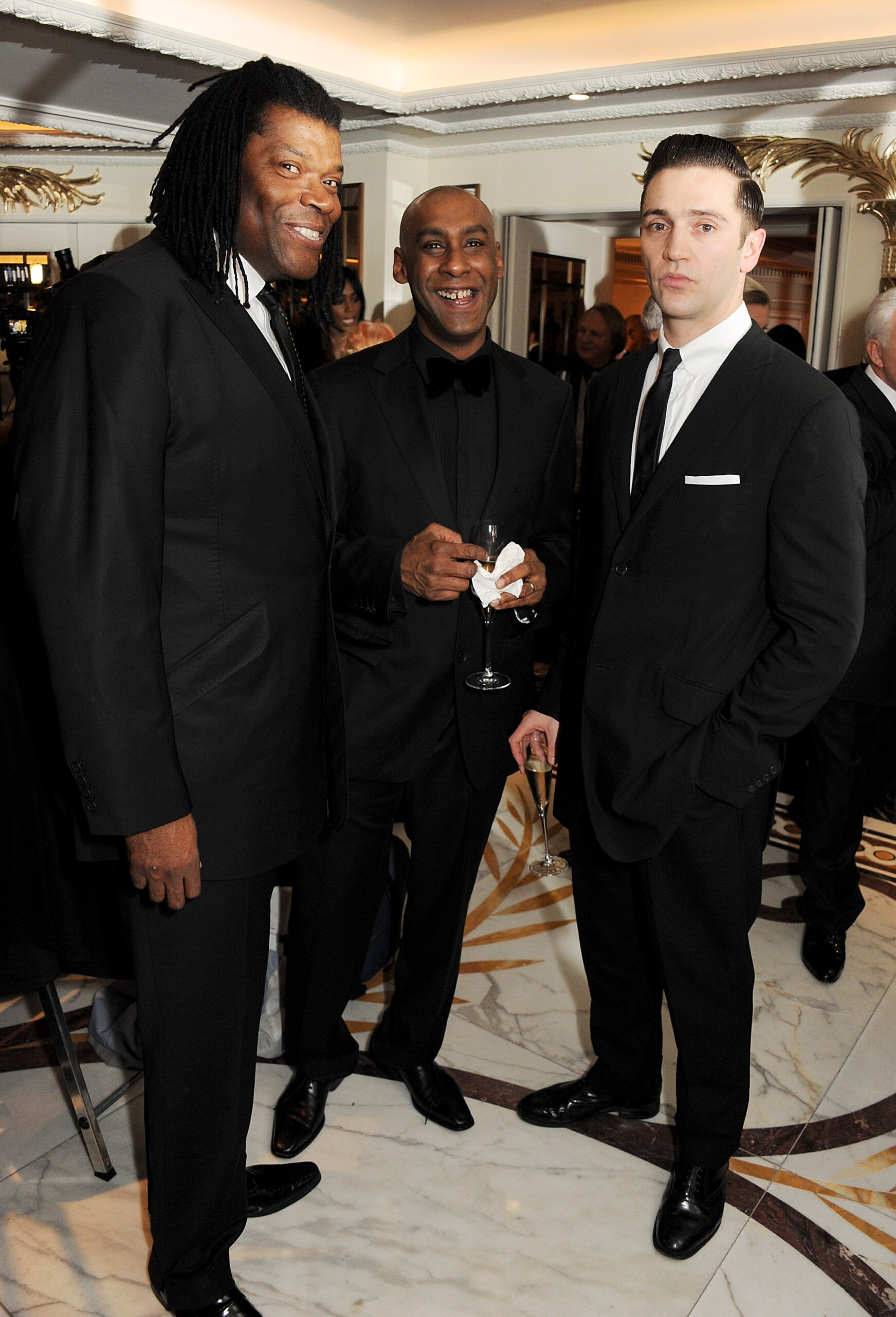 Dale Davis (M) with Amy Winehouses Manager Raye Cosbert (L) and her bereaved husband Reg Traviss (R)