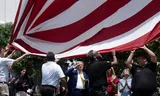 President Trump left during the installation of a flagpole at the White House in the middle whether he wants to bomb Iran. Photo Brendan Smialowski/AFP 